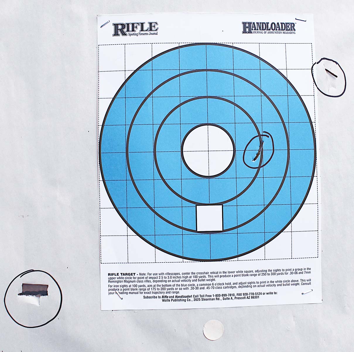No wooden bullet or piece of bullet struck a paper target until it was only nine feet away. Splinters are circled on the right, and a bullet “keyhole” on the lower left. Three separate shots. Hold was standard six o’clock.